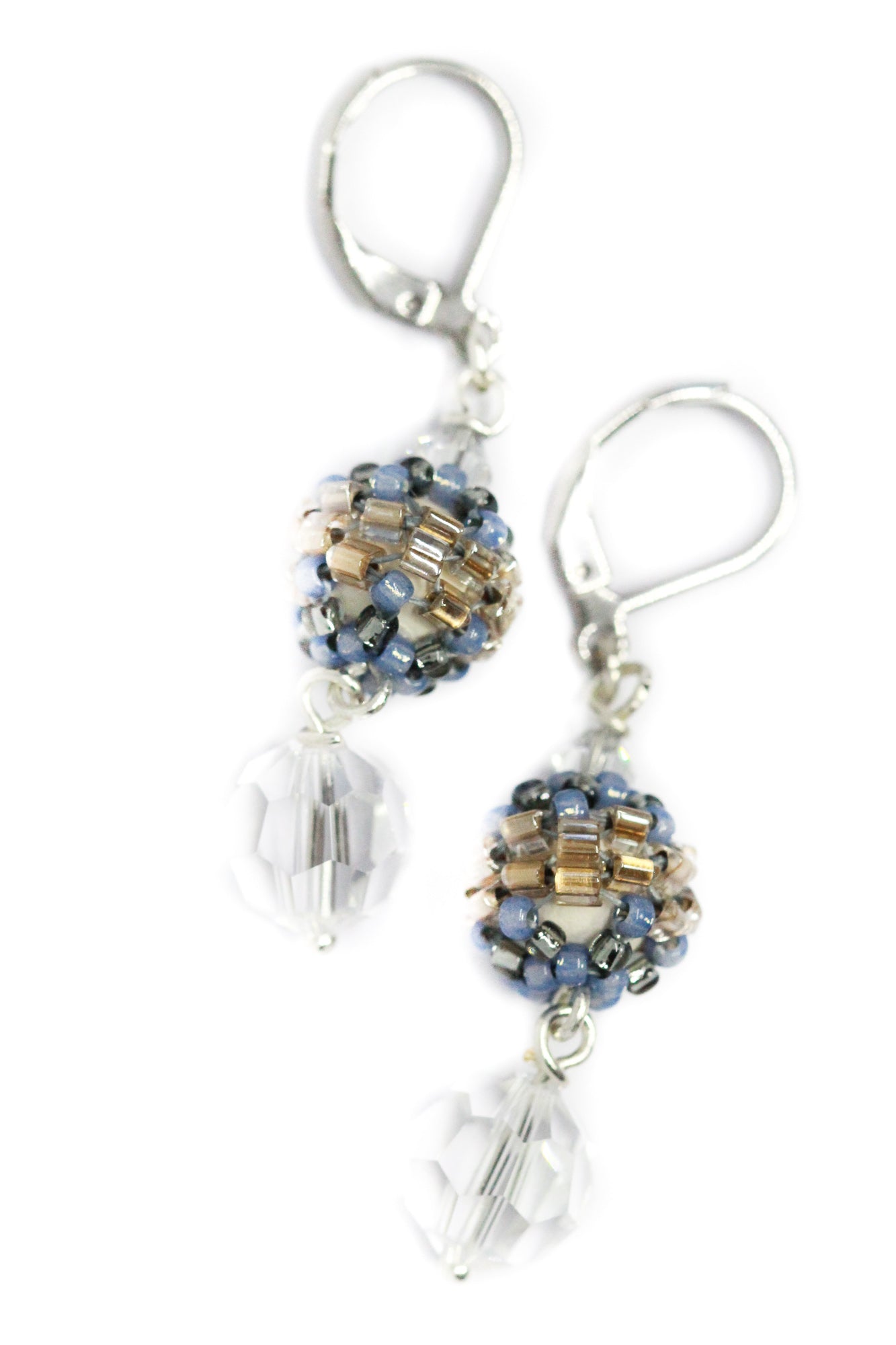 Elegant crystal drop earrings that will delicately compliment any wedding dress or outfit. #crystaldropearrings #dropearrings #handmadeearrings #designerearrings #bridalgift #somethingbluegift