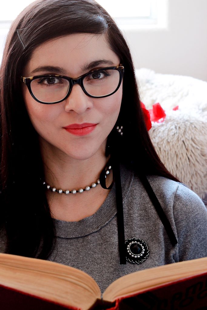 Long pearl necklace with magnetic black beaded brooch