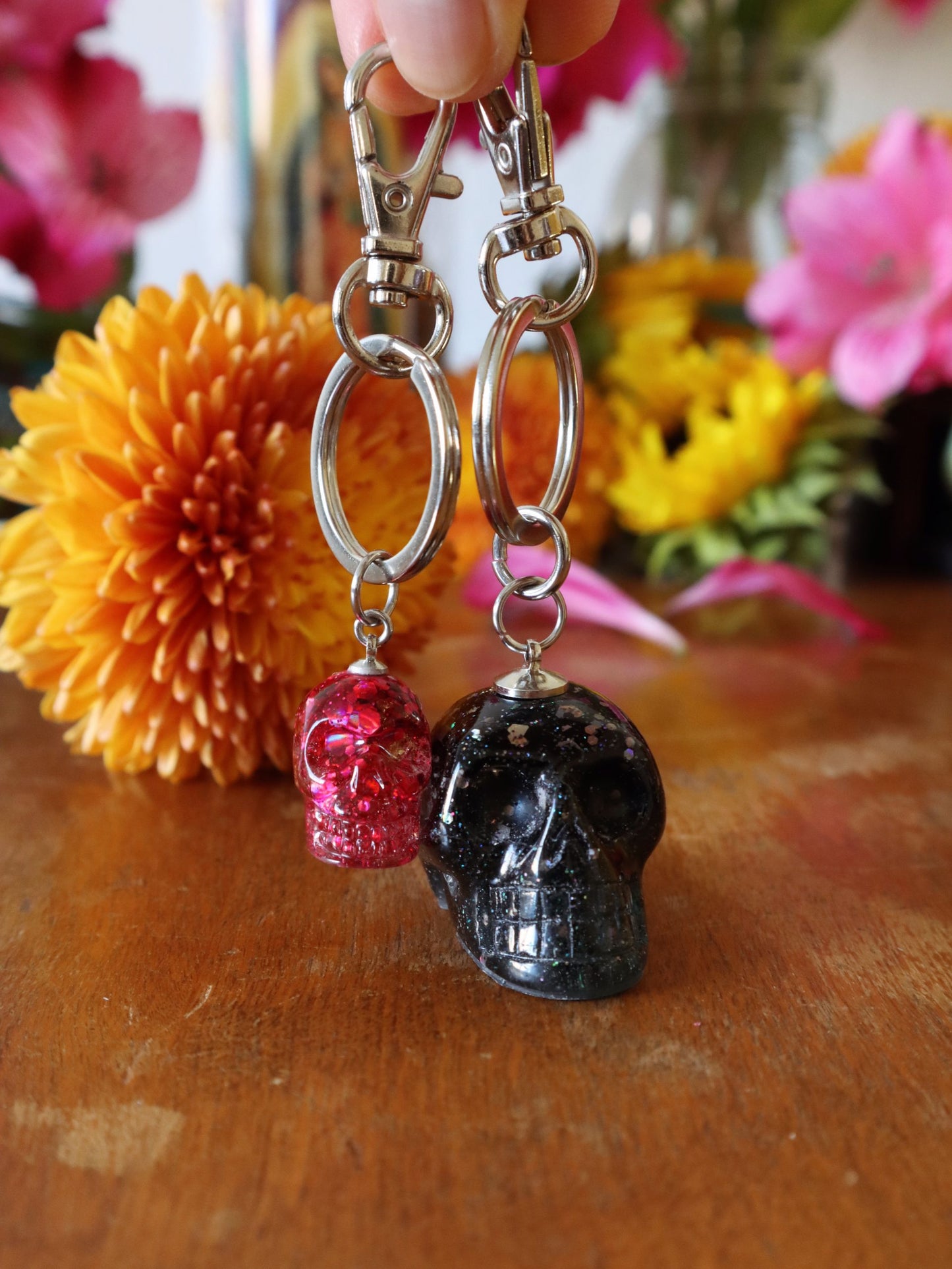 Pink-Glitter-Skull-Charm-vs-Chrome-Glitter-Skull-Keychain---Size-comparison