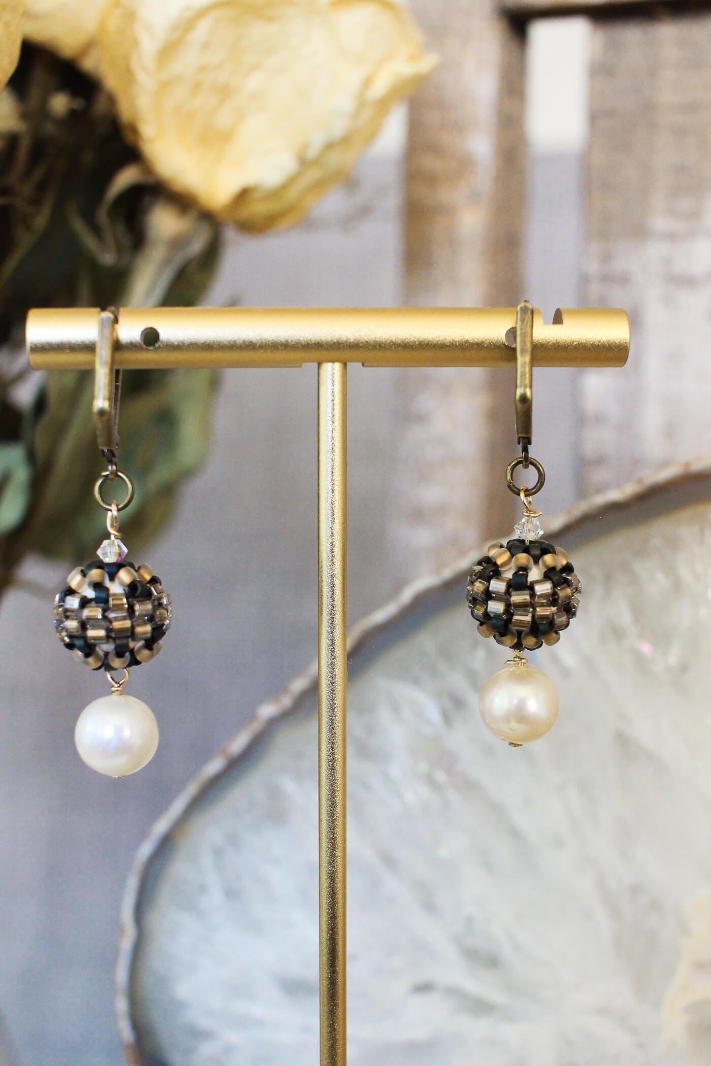 Pearl drop earrings designed with something old and something new for the vintage soul. #pearlearrings #pearldropearrings #dangleanddropearrigs #dangleearrings