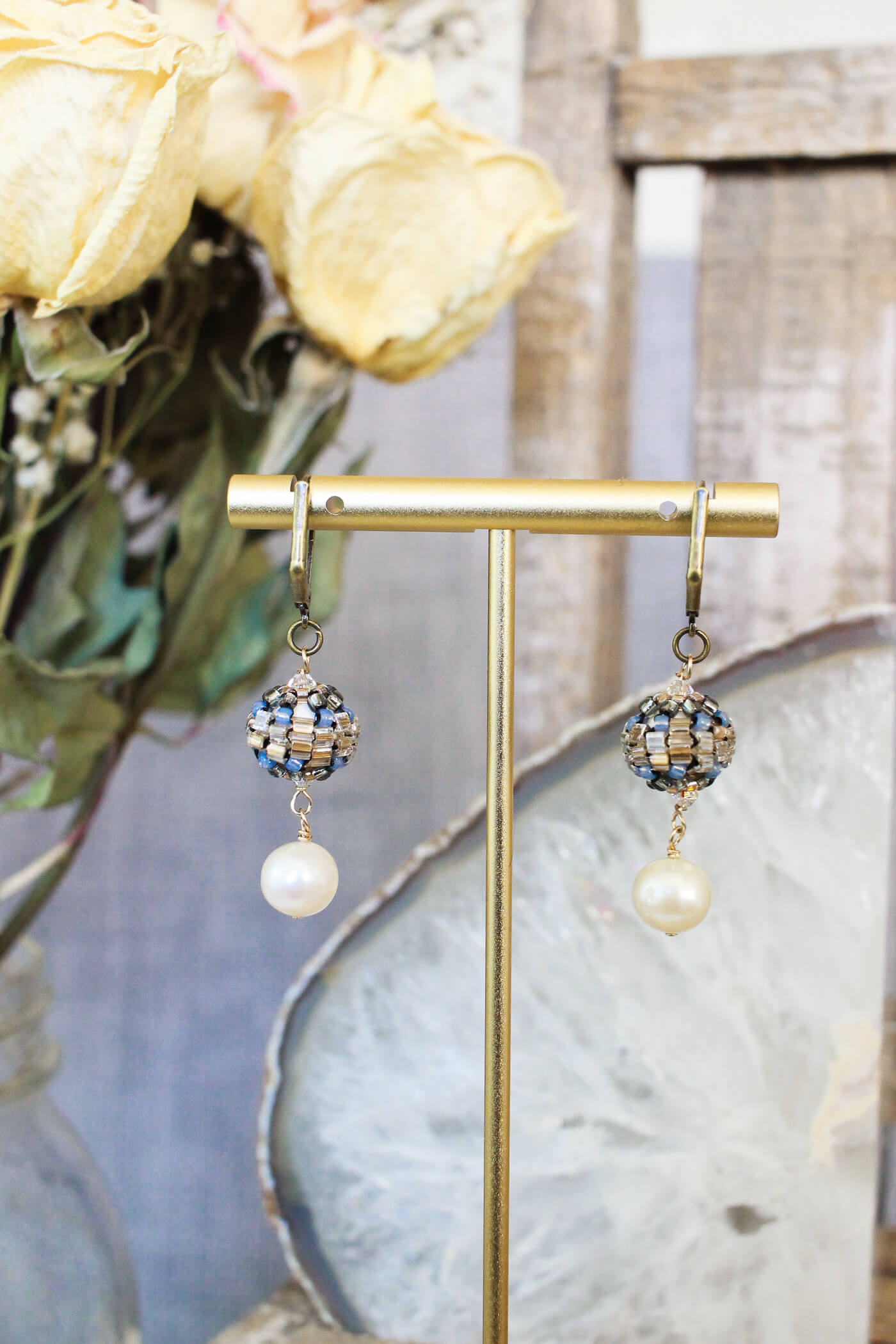 Pearl drop earrings designed with something old and something new for the vintage soul. #pearlearrings #pearldropearrings #dangleanddropearrigs #dangleearrings