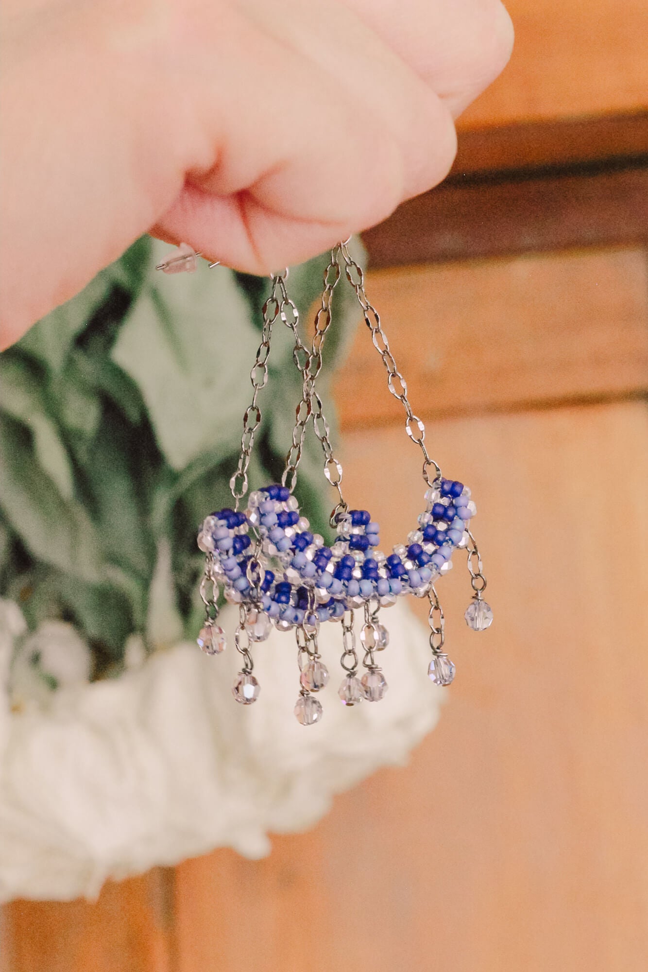 Chandelier earrings delicately made with tiny beads of various shades of blue and silver accents – a timeless set of earrings #somethingblue #bridalaccessories #vintageinspired #statementearrings #hottahaveit