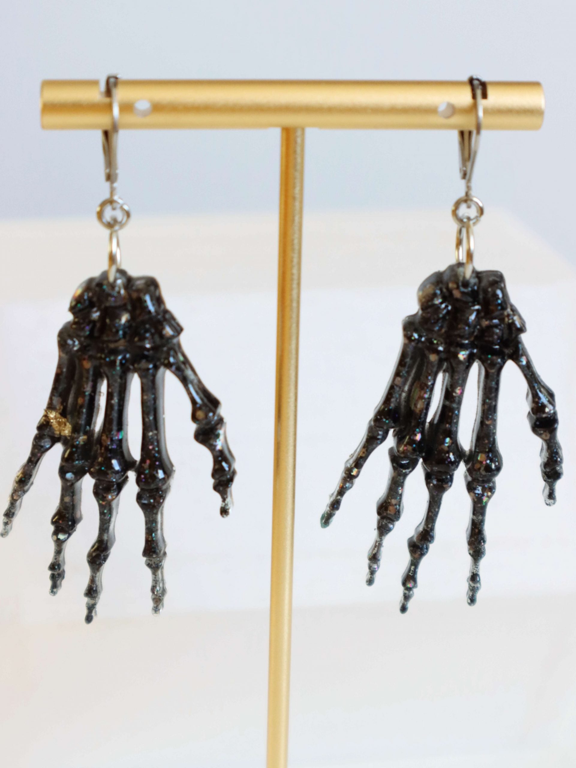 black-glitter-skeleton-hand-earrings-by-kaleidoscopes-and-polkadots