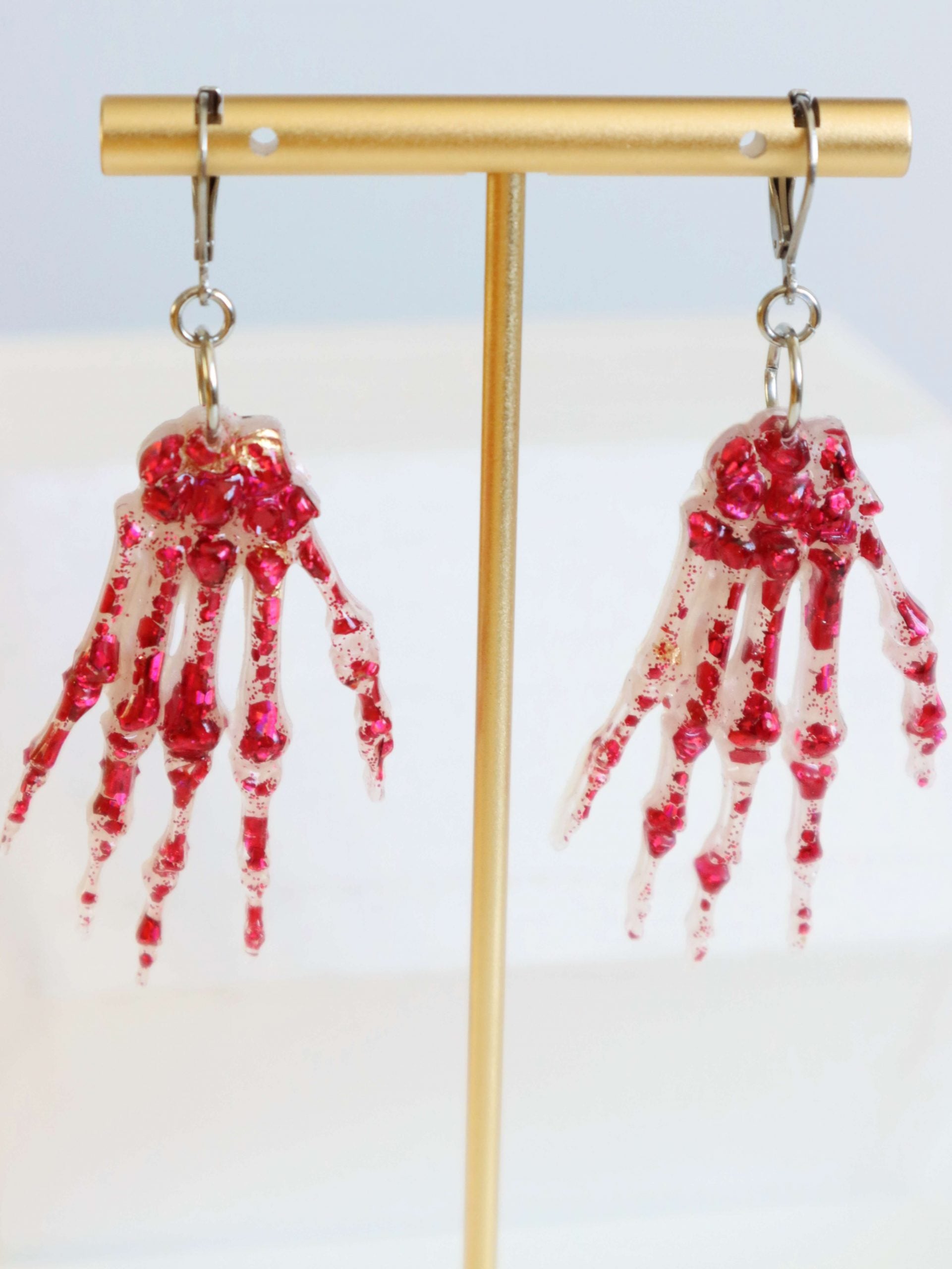 pink-glitter-skeleton-hand-earrings-by-kaleidoscopes-and-polkadots